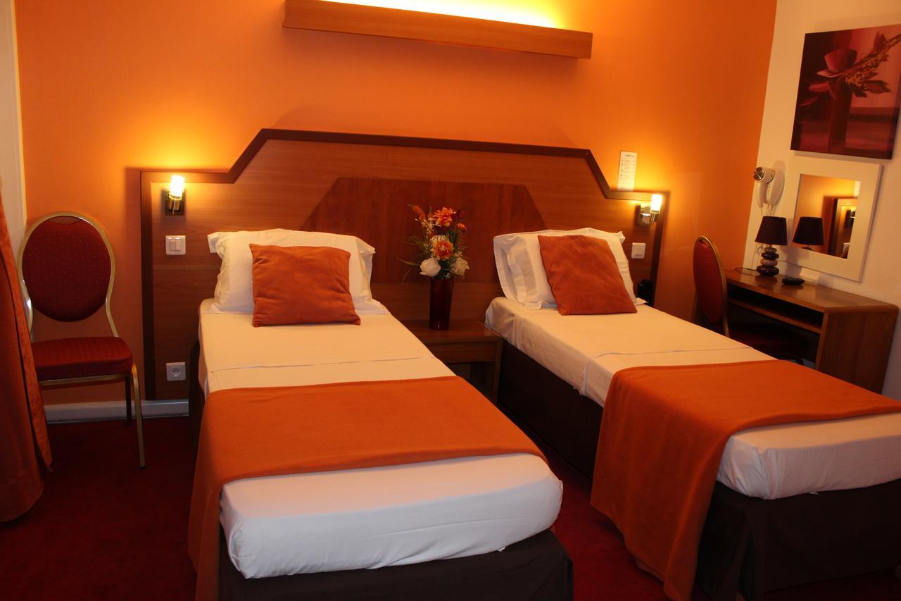 นูเวล โฮเต็ล ดู เธียเตอร์ Hotel ปารีส ภายนอก รูปภาพ